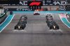 ABU DHABI, UNITED ARAB EMIRATES - NOVEMBER 20: Max Verstappen of the Netherlands driving the (1) Oracle Red Bull Racing RB18 and Sergio Perez of Mexico driving the (11) Oracle Red Bull Racing RB18 head the field as they prepare for the start during the F1 Grand Prix of Abu Dhabi at Yas Marina Circuit on November 20, 2022 in Abu Dhabi, United Arab Emirates. (Photo by Mark Thompson/Getty Images) // Getty Images / Red Bull Content Pool // SI202211202239 // Usage for editorial use only //